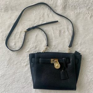 Black Michael Kors purse with Gold details